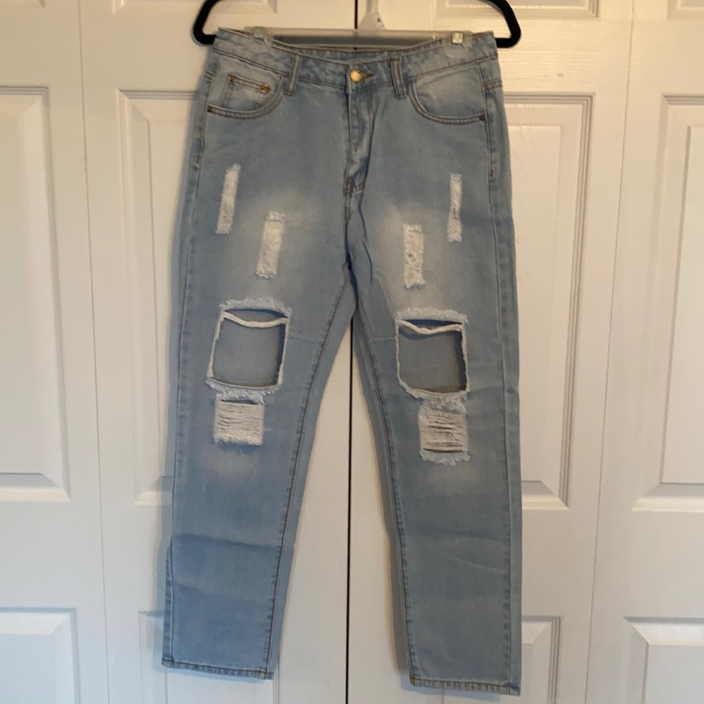 Ripped jeans, M, never worn